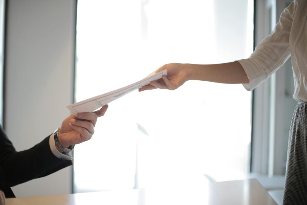 Hand holding house keys after a mortgage pre-approval