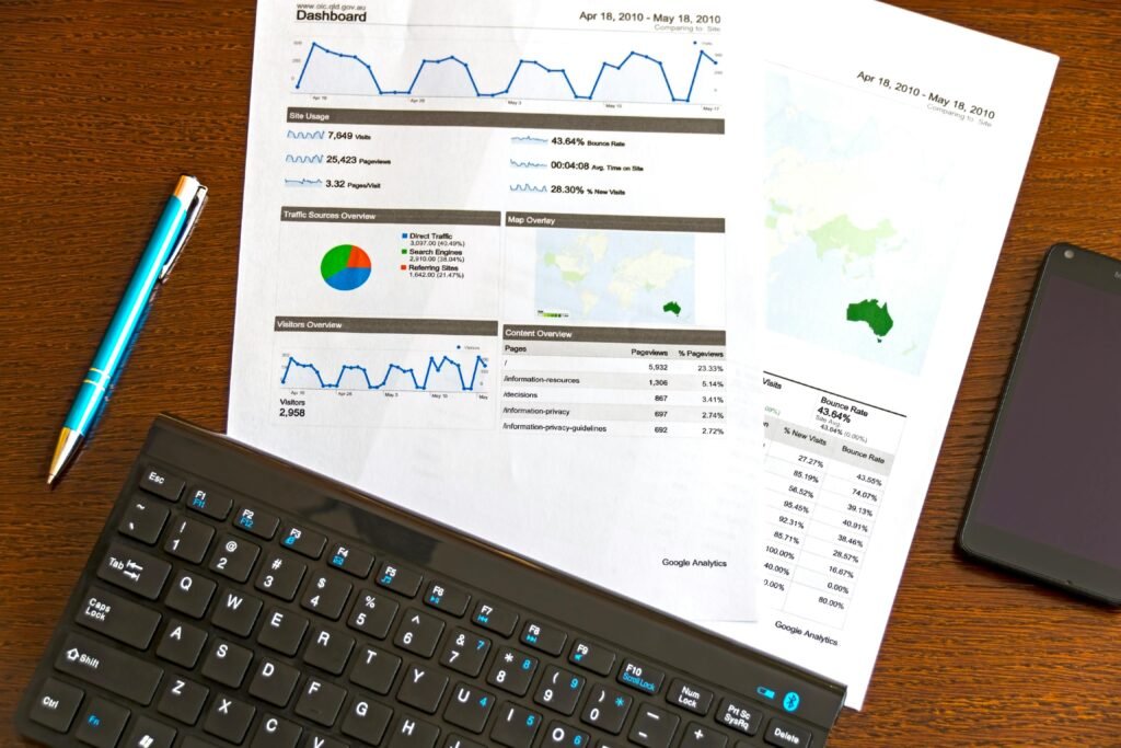 Reports, pen and keyboard, reviewing policies to avoid insurance mistakes
