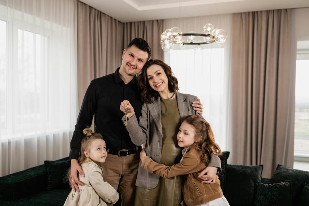 First-time home buyers reviewing mortgage documents before closing