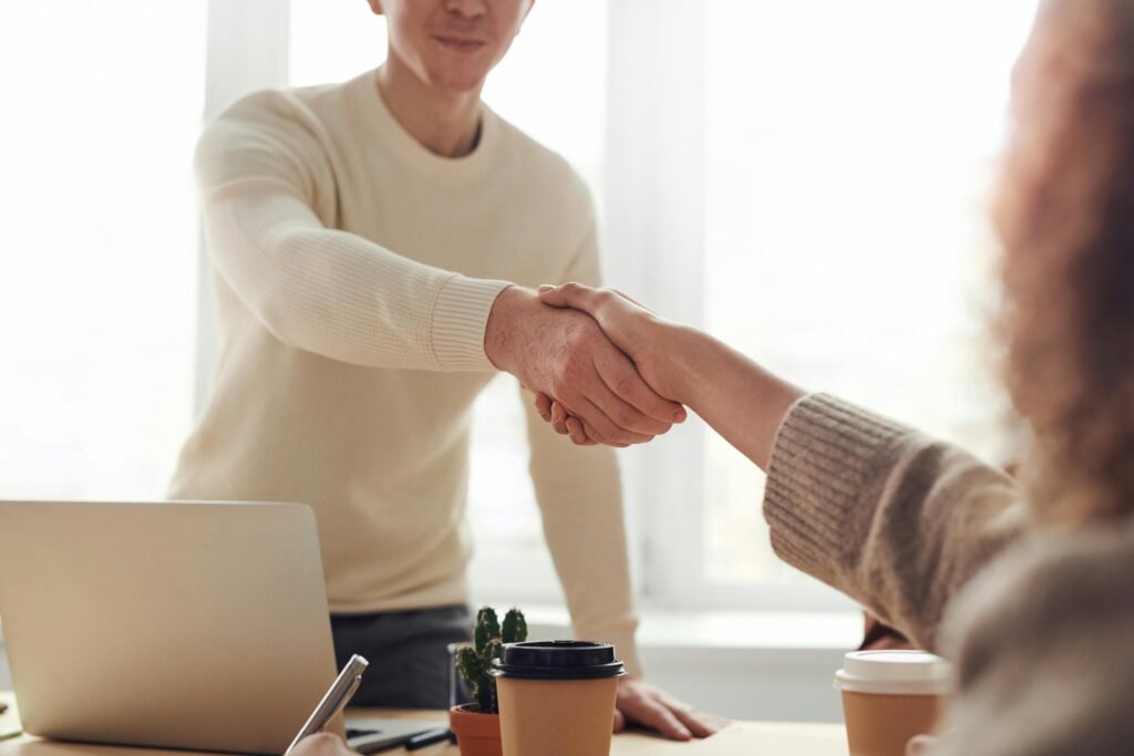 How to negotiate salary — professional reviewing job offer on laptop