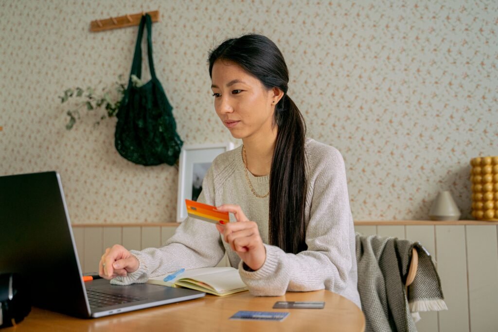 What is credit utilization — person checking credit card balance and bill