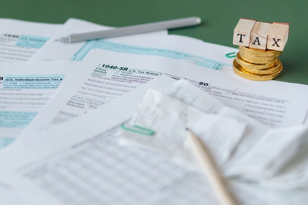 What are tax brackets — person calculating federal income taxes using 2026 tax bracket table