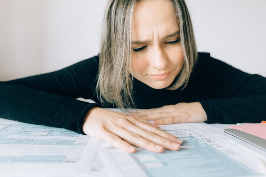Standard deduction vs itemized — person comparing tax deduction options.