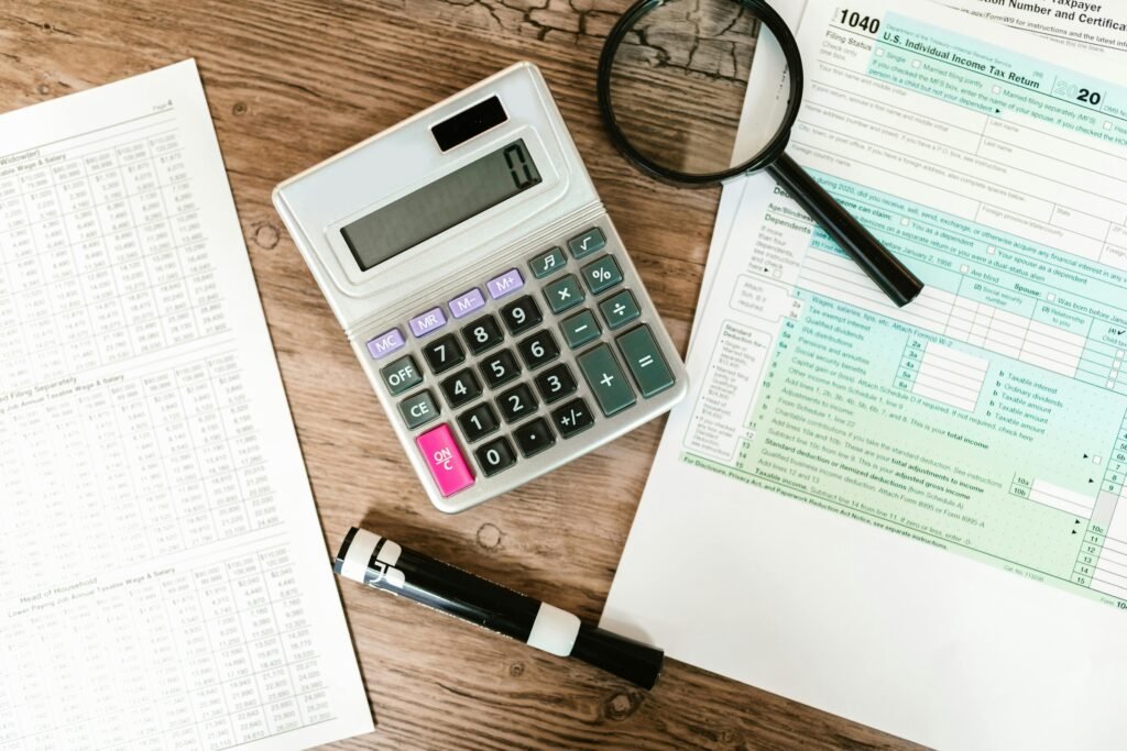 How to file taxes with a W-2 and a 1099 — tax forms on a desk