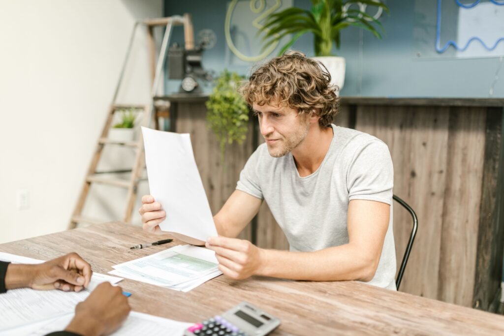 How to save for retirement in your 30s — person reviewing investment portfolio at home