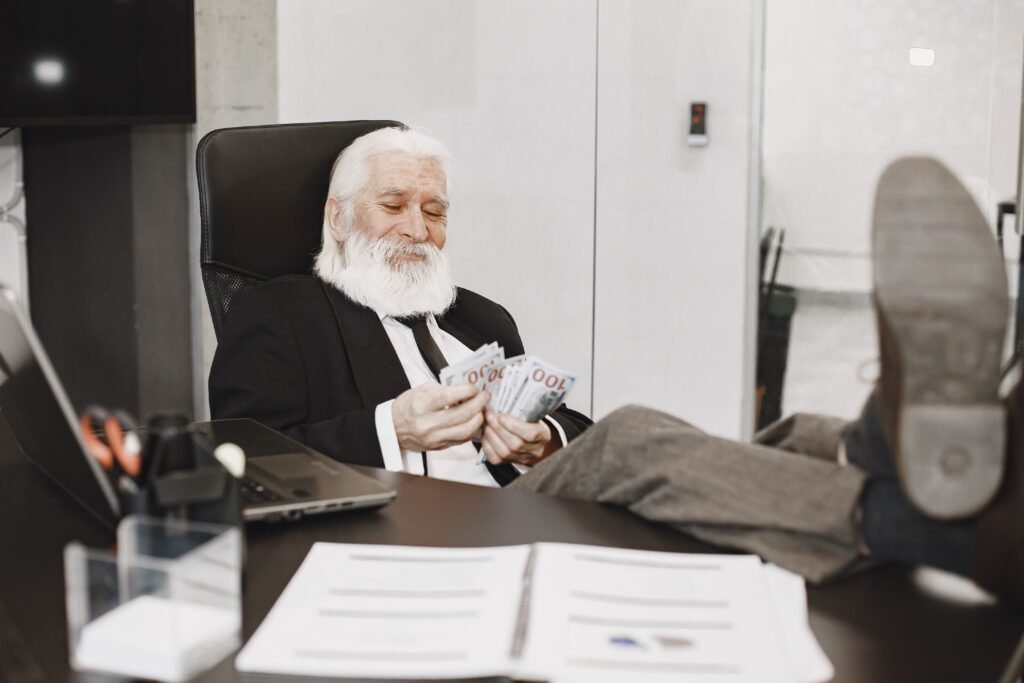 401(k) and IRA contribution limits 2026 — person calculating retirement contributions for the new tax year