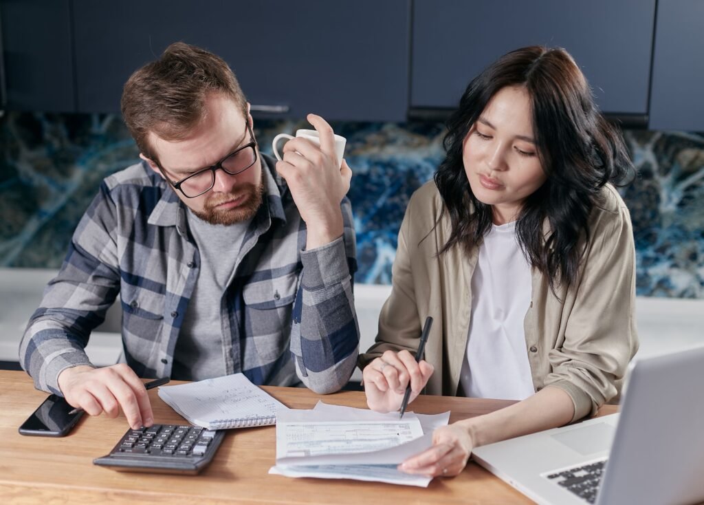 What is a HELOC and how does it work — homeowner calculating draw period payments