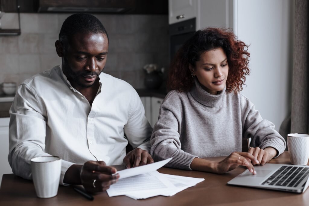 Adjustable-rate mortgage explained — couple comparing ARM vs fixed rate options in 2026