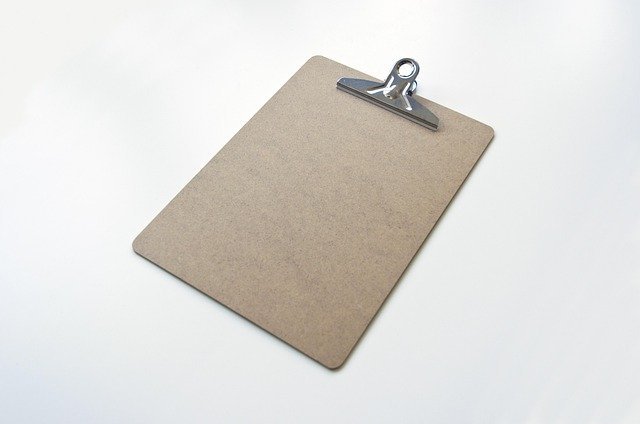 Blank clipboard for a checklist to avoid insurance mistakes