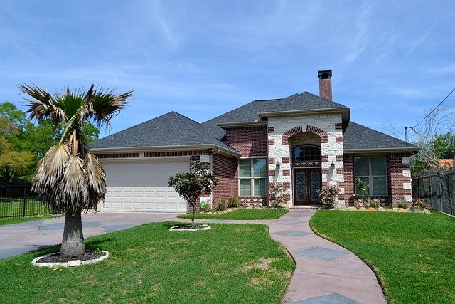 Brick house with a front lawn, the equity behind a cash out refinance