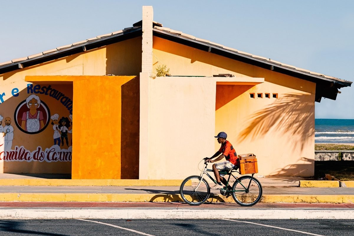 Cyclist making deliveries as one of the local side hustles 2026