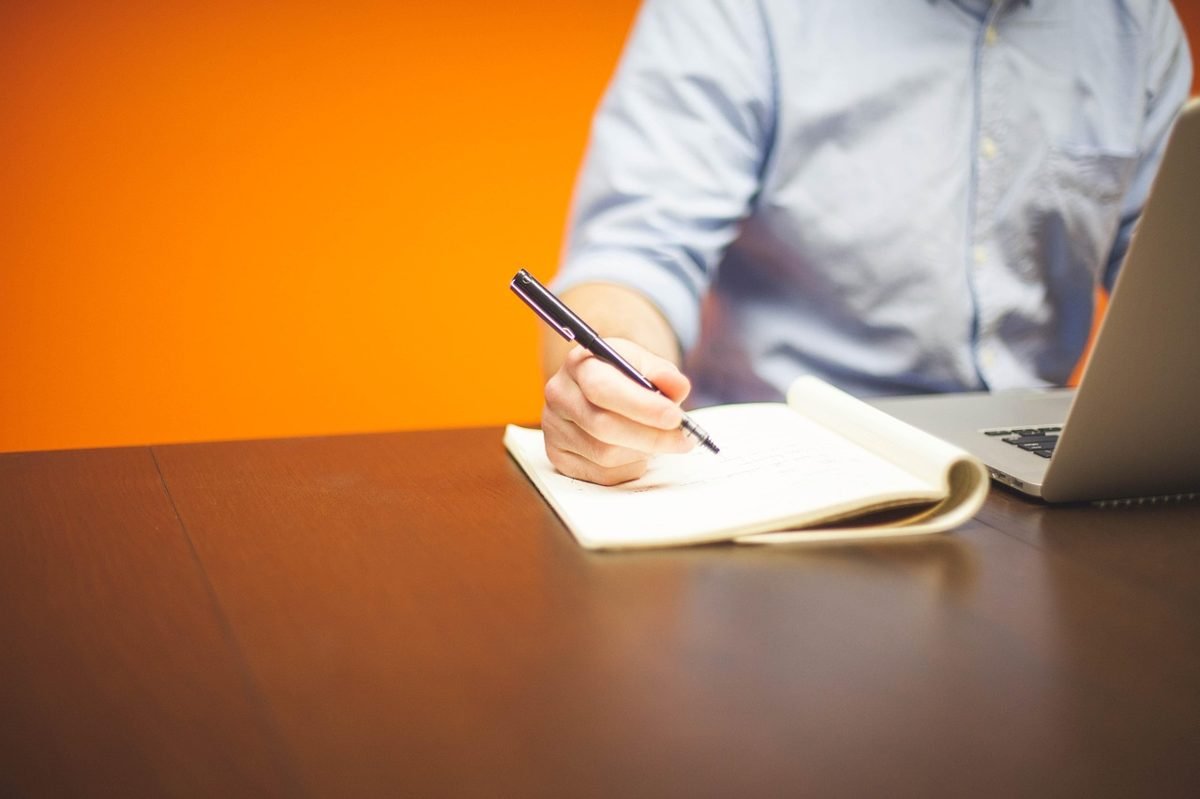 Self-employed worker planning a solo 401k at a desk