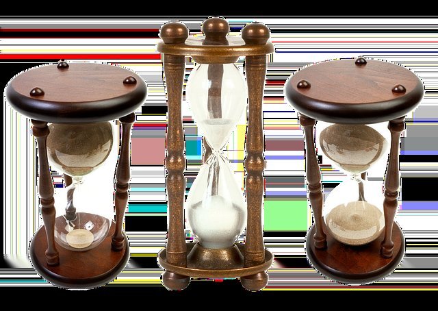 Hourglasses showing time passing on a dollar-cost averaging vs lump sum schedule