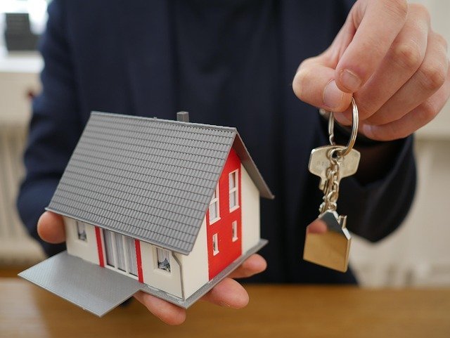 House keys in a door, the home covered by homeowners insurance