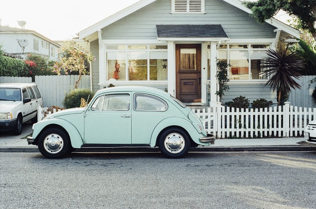 Home with a vintage car, the long-term side of a fixed vs adjustable rate mortgage