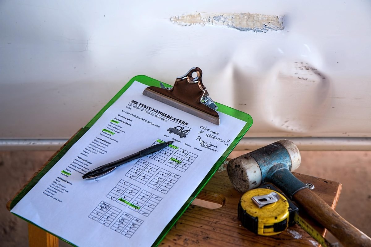 Clipboard checklist and tools used during a home inspection