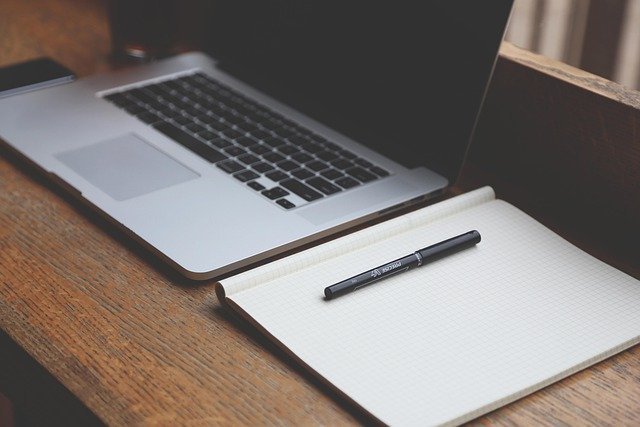 Laptop and notebook for building digital passive income ideas