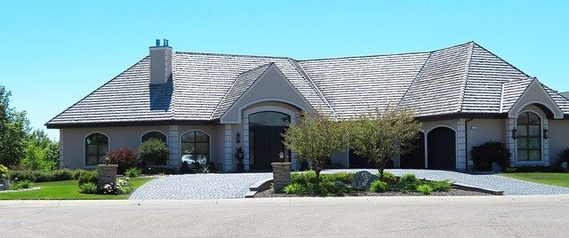 Modern luxury home exterior, rebuild cost that sets homeowners insurance limits
