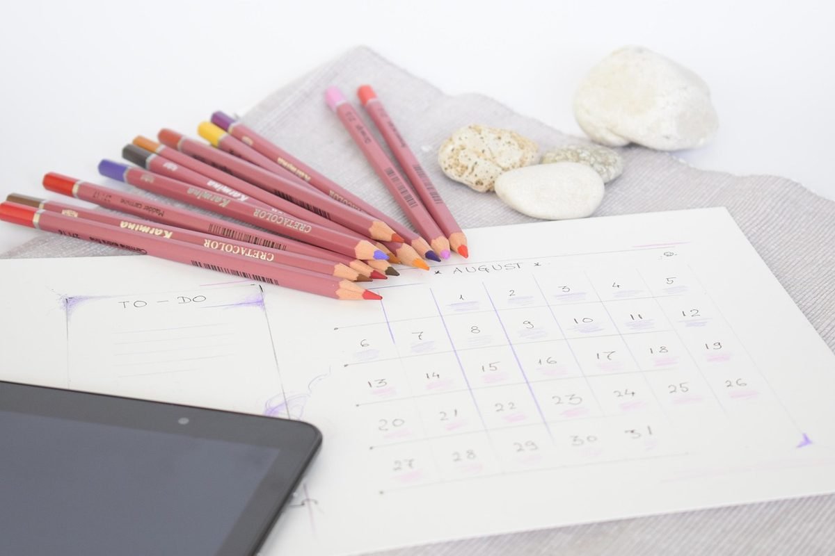 Monthly calendar planner used to match bill due dates to paydays