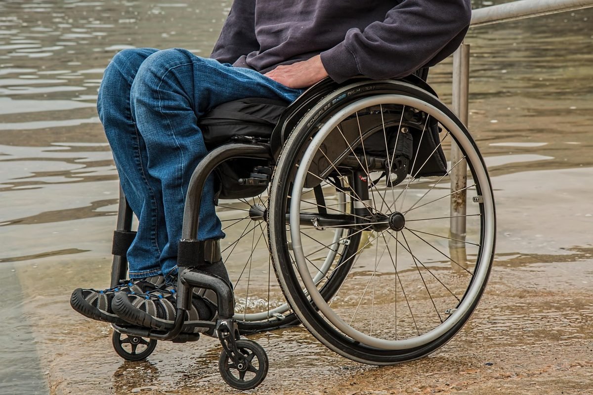 Person in a wheelchair, showing why you may need disability insurance