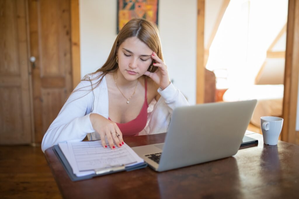 SAVE Plan ending: student reviewing student loan repayment options on a laptop