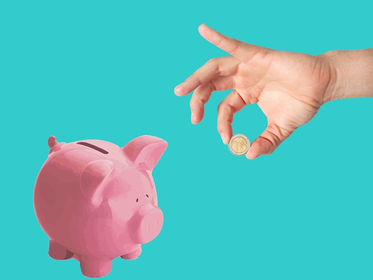Piggy bank and coin for saving while investing in 2026