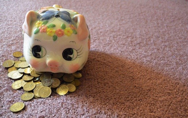 Piggy bank with coins, small savings that can go into treasury bills