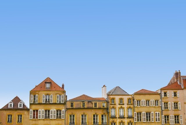 Row of apartment buildings where renters insurance protects tenants