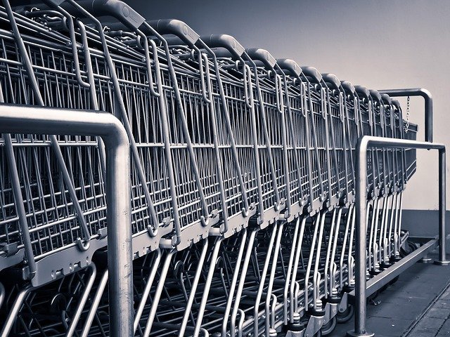 Row of shopping carts, the checkout moment where buy now pay later is offered