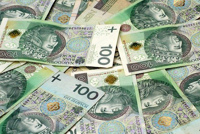 Stacks of banknotes standing in for the savings split across a cd ladder