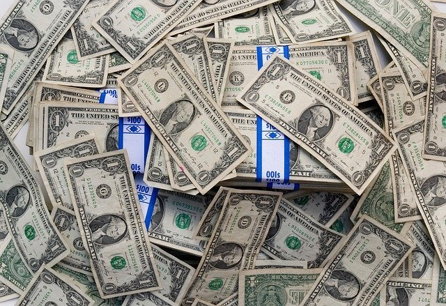 Stacks of dollar bills, the cash a money market account is built to hold