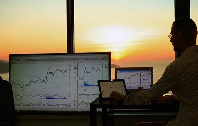 Stock trading screen with charts, what a brokerage app shows beginners