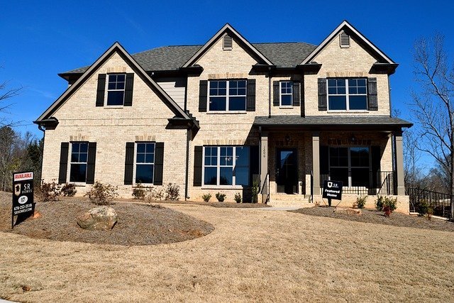 Two-story brick house, a home where private mortgage insurance ends as equity grows